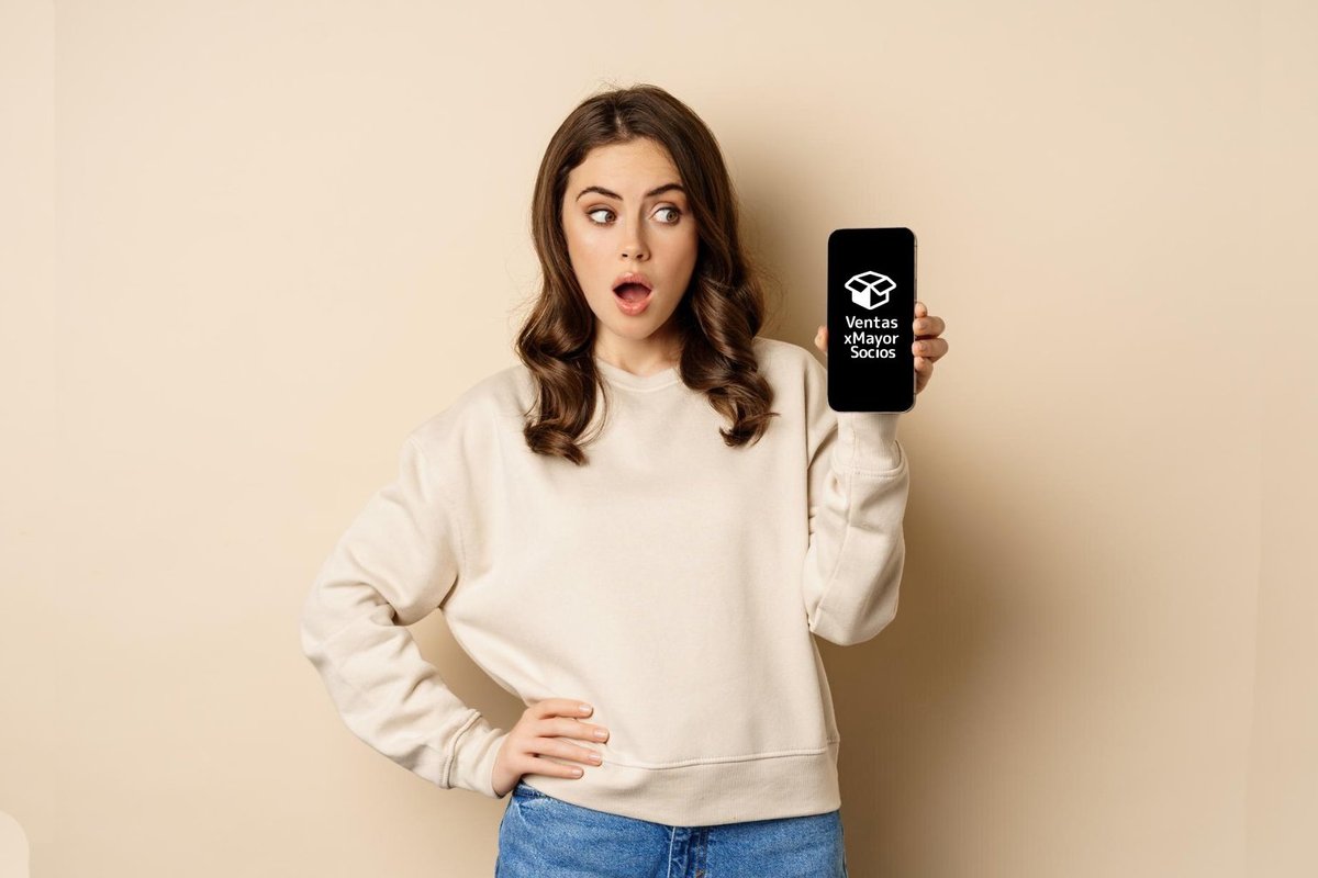 Woman showing a phone that indicates the vxm partner program